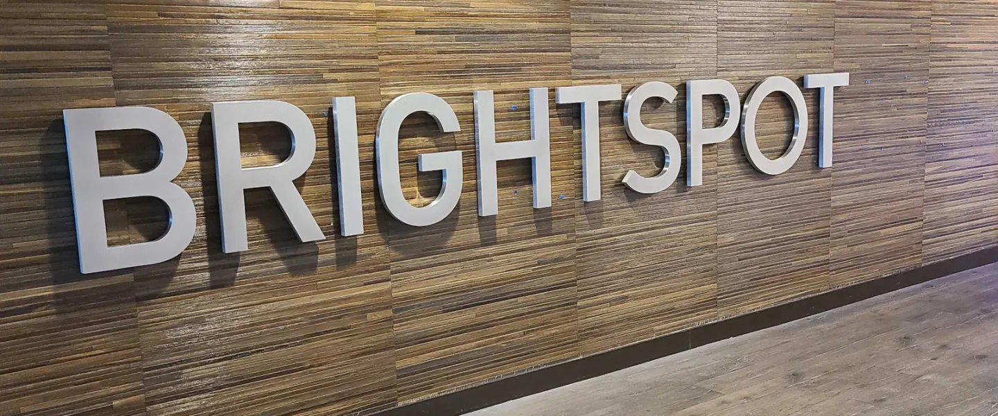 Brightspot company logo on wall of Brightspot's main office in Reston, Virginia