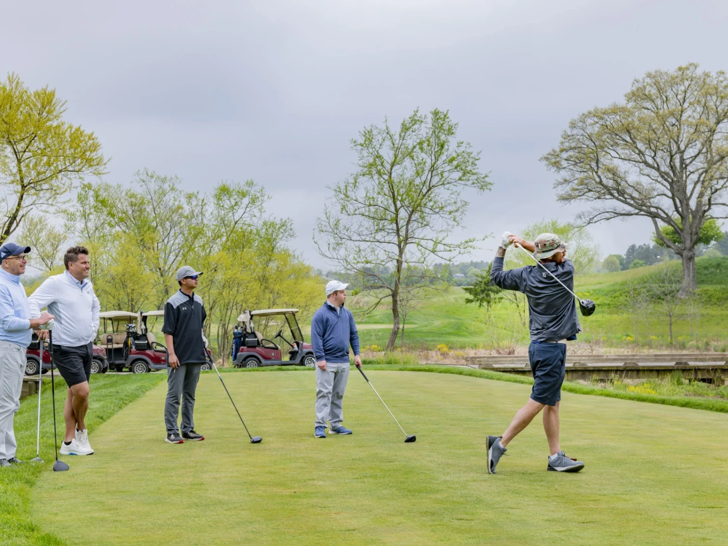 Golfer tees off during the 2022 Brightspot Unified Challenge